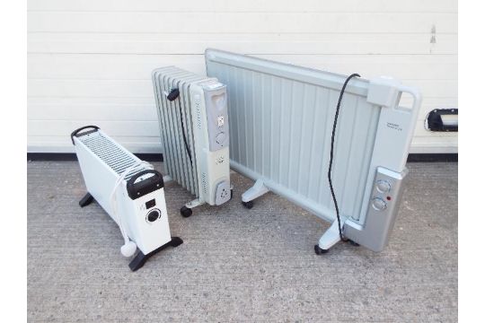 Two oil filled radiators and one convector heater, largest approximately 62 cm (h).