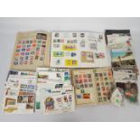 Philately - Three albums containing stamps, loose stamps,