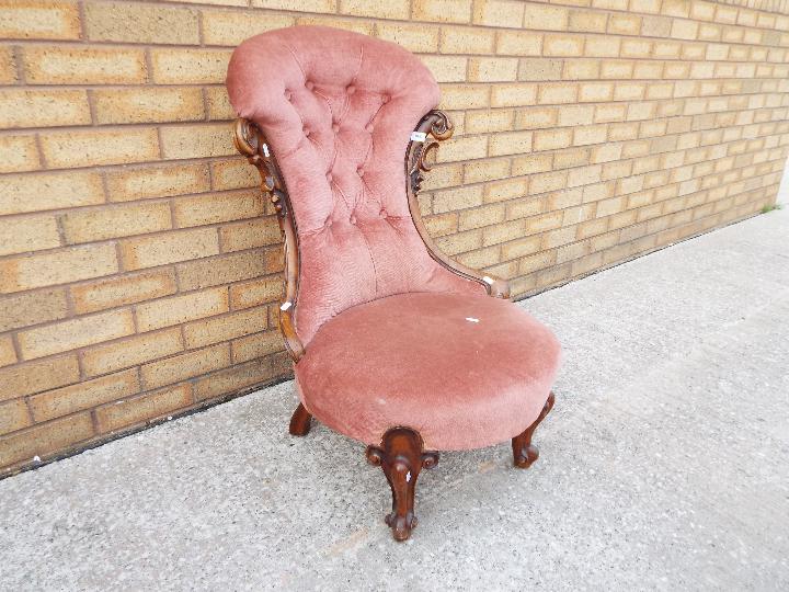 An upholstered nursing chair. - Image 2 of 2