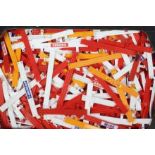 Scalextric - A box full of Scalextric trackside barriers in red, white and yellow.