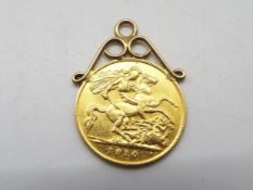 Gold Coin - Edward VII, half sovereign, 1910, with yellow metal pendant mount, approximately 4.