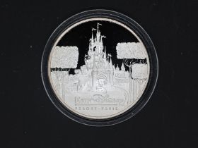Silver - Euro Disney- A 1 troy oz (31.1 grams) fine grade .