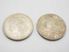 Two US Morgan Dollars, 1889 and 1921, both Philadelphia mint.