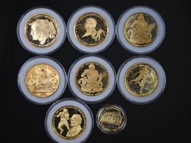 A set of eight collectible Superbowl coins / medallions struck by Liberty mint in the USA.