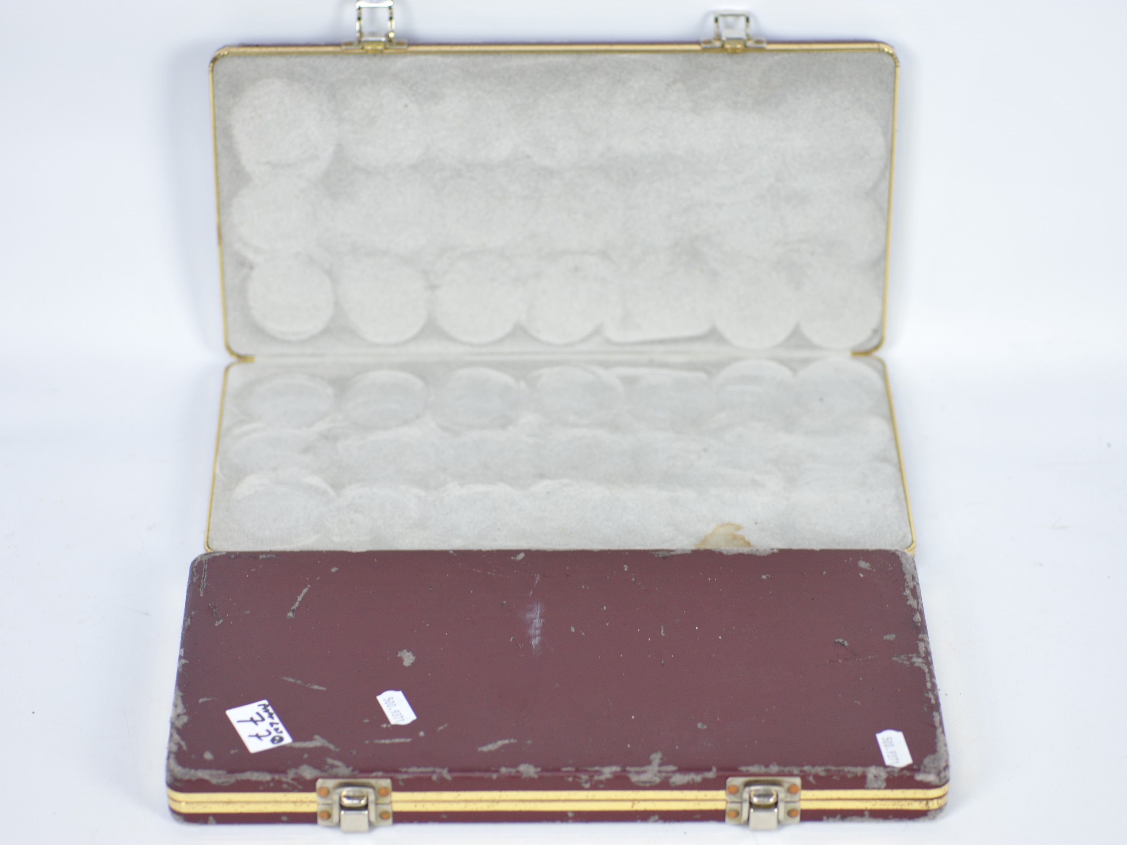 Two Liberty mint coin / medallion display cases in burgundy with a sponge and felt linning.
