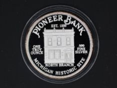 Silver - Pioneer Bank- A 1 troy oz (31.1 grams) fine grade .