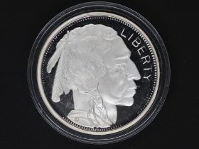 Silver - Liberty - A 2 troy oz (62 grams) fine grade .