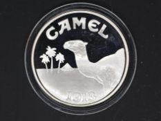 Silver - Camel cigarettes- A 1 troy oz (31.1 grams) fine grade .