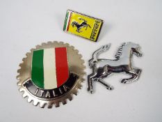 Car badges to include Ferrari.