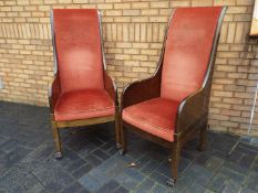 An upholstered pair of throne chairs, th