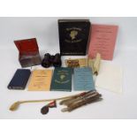 Mixed collectables to include savings bank, opera glasses, silver handled butter knives and similar.