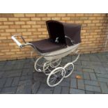 A vintage Silver Cross pram in good condition.