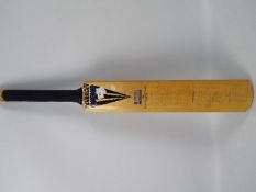 A Duncan Fearnley full size Cricket Bat