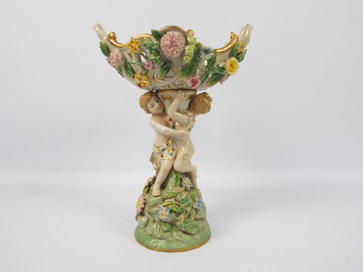 A Meissen style figural centerpiece with