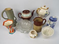 Mixed ceramics and glassware to include teapots, jelly moulds, vases and other.