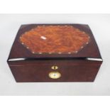 A cedar lined humidor with external bras