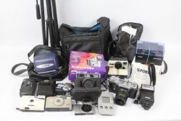 Photography - A collection of cameras and accessories.