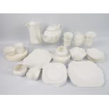 Shelley - A collection of white glaze, Dainty tea wares, in excess of forty pieces.