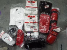 A collection of new martial arts clothing and protective equipment by World Of Martial Arts,