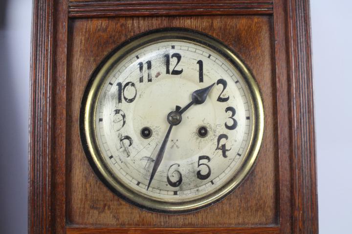 An oak cased HAC wall clock with key and - Image 6 of 8