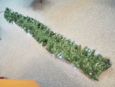 Home Decor - A 9 foot green garland with warm white lights, boxed.