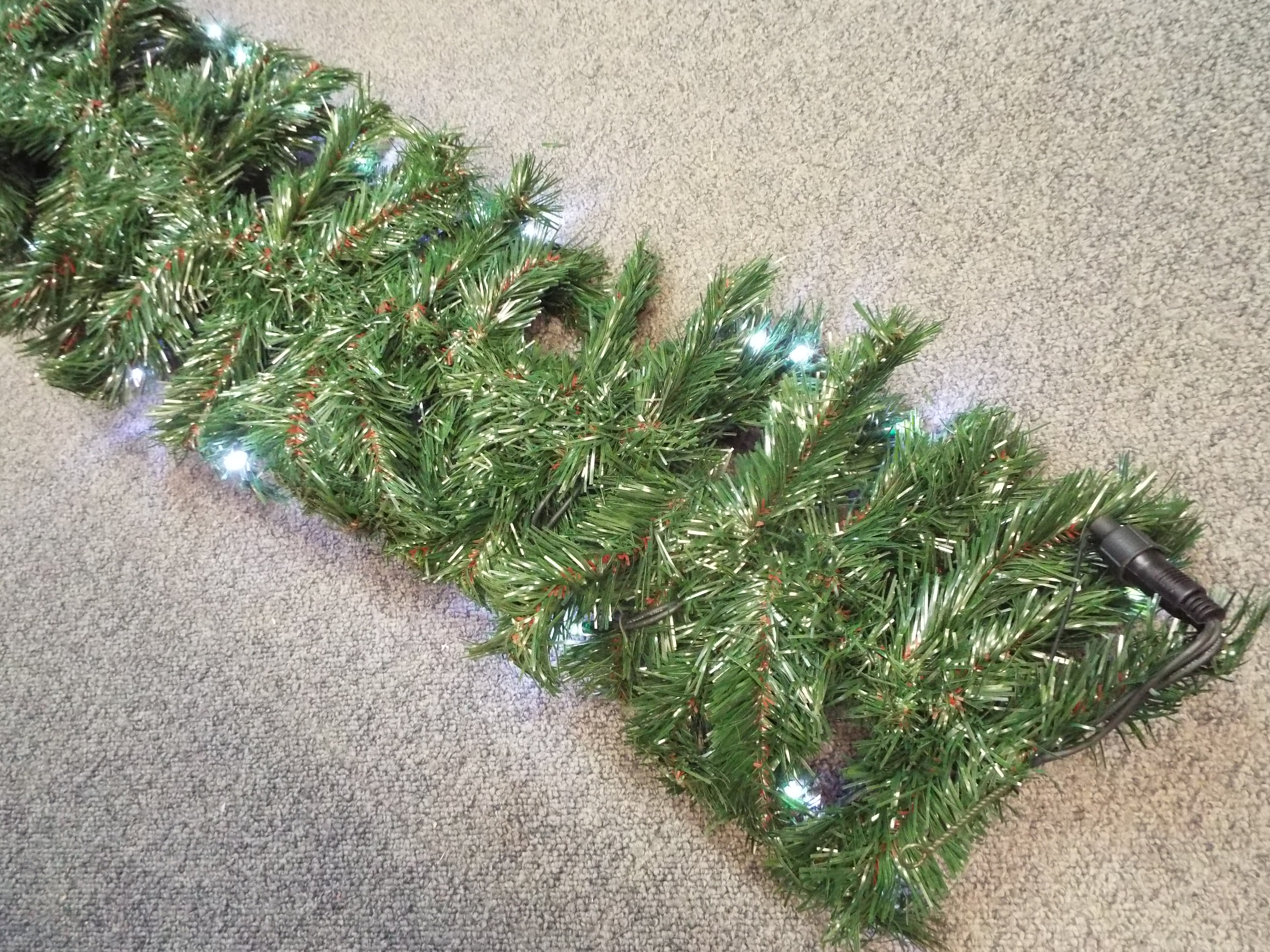 Home Decor - A 9 foot green garland with ice white lights, boxed. - Image 2 of 4