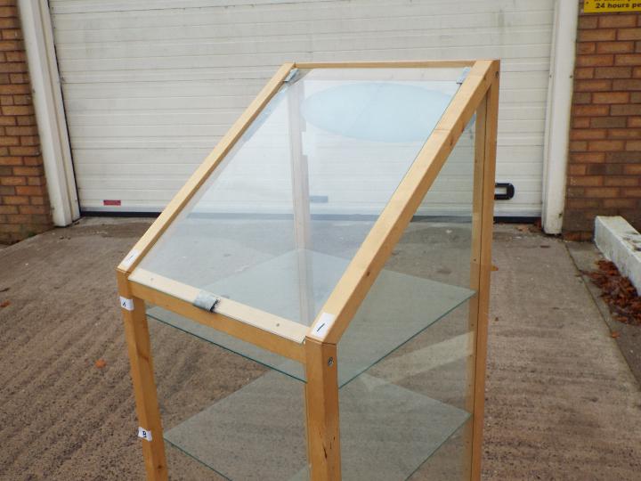 A pine framed display cabinet with glass shelves, approximately 137 cm x 46 cm x 48. - Image 3 of 4