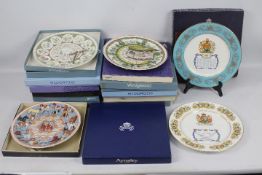 A collection of boxed Wedgwood calendar plates, commemorative plates and similar.