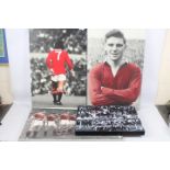 Manchester United - Four prints on canvas, varying sizes.