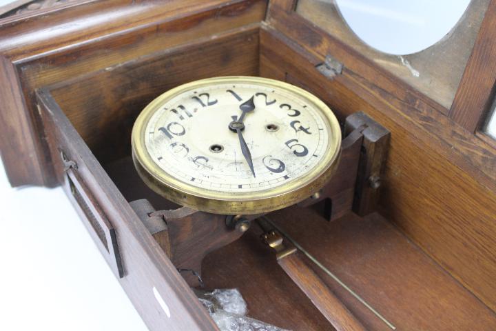 An oak cased HAC wall clock with key and - Image 7 of 8