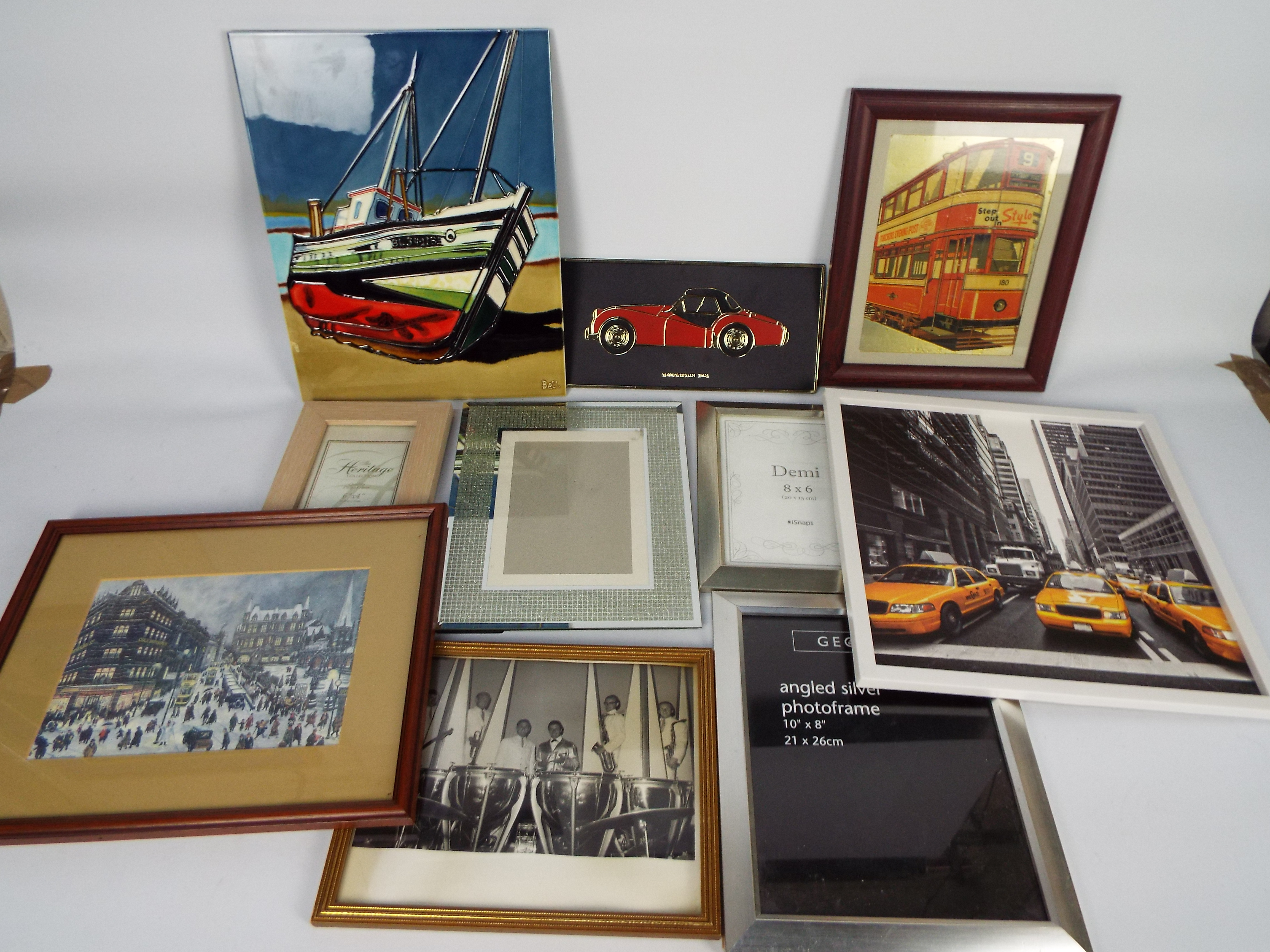 A collection of wall art, picture frames