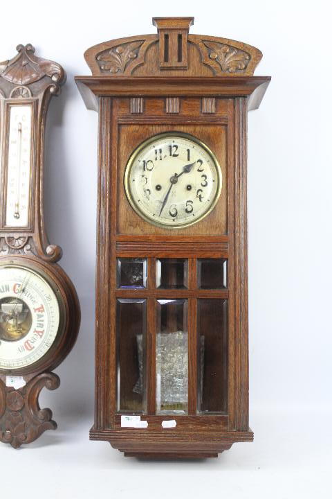 An oak cased HAC wall clock with key and - Image 5 of 8