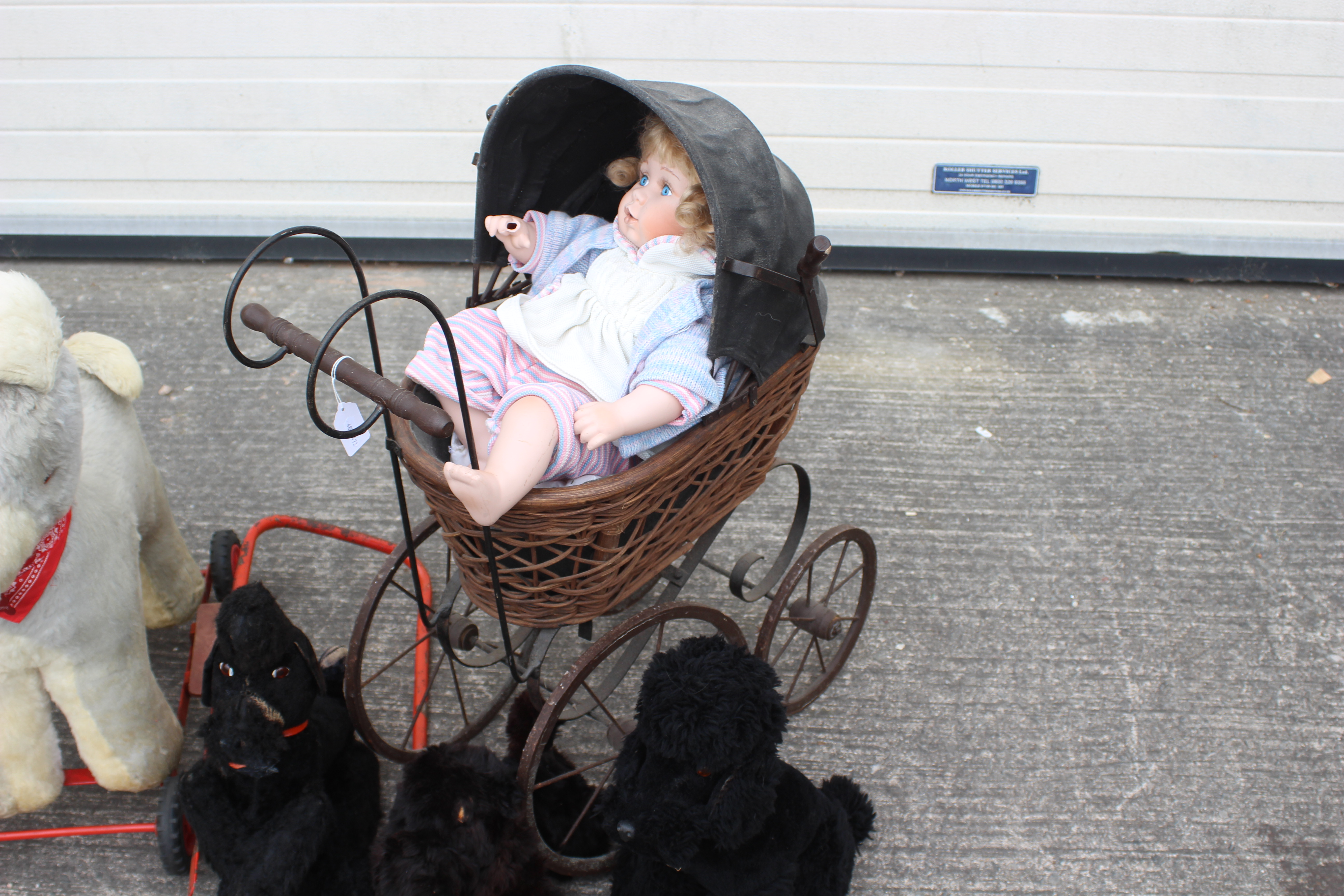 A group of vintage soft toys, a modern doll and ornamental Victorian styled pram. - Image 5 of 6