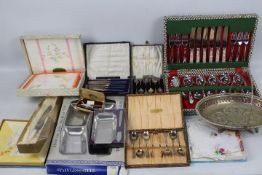 Lot to include flatware, plated ware, vintage linen and other.