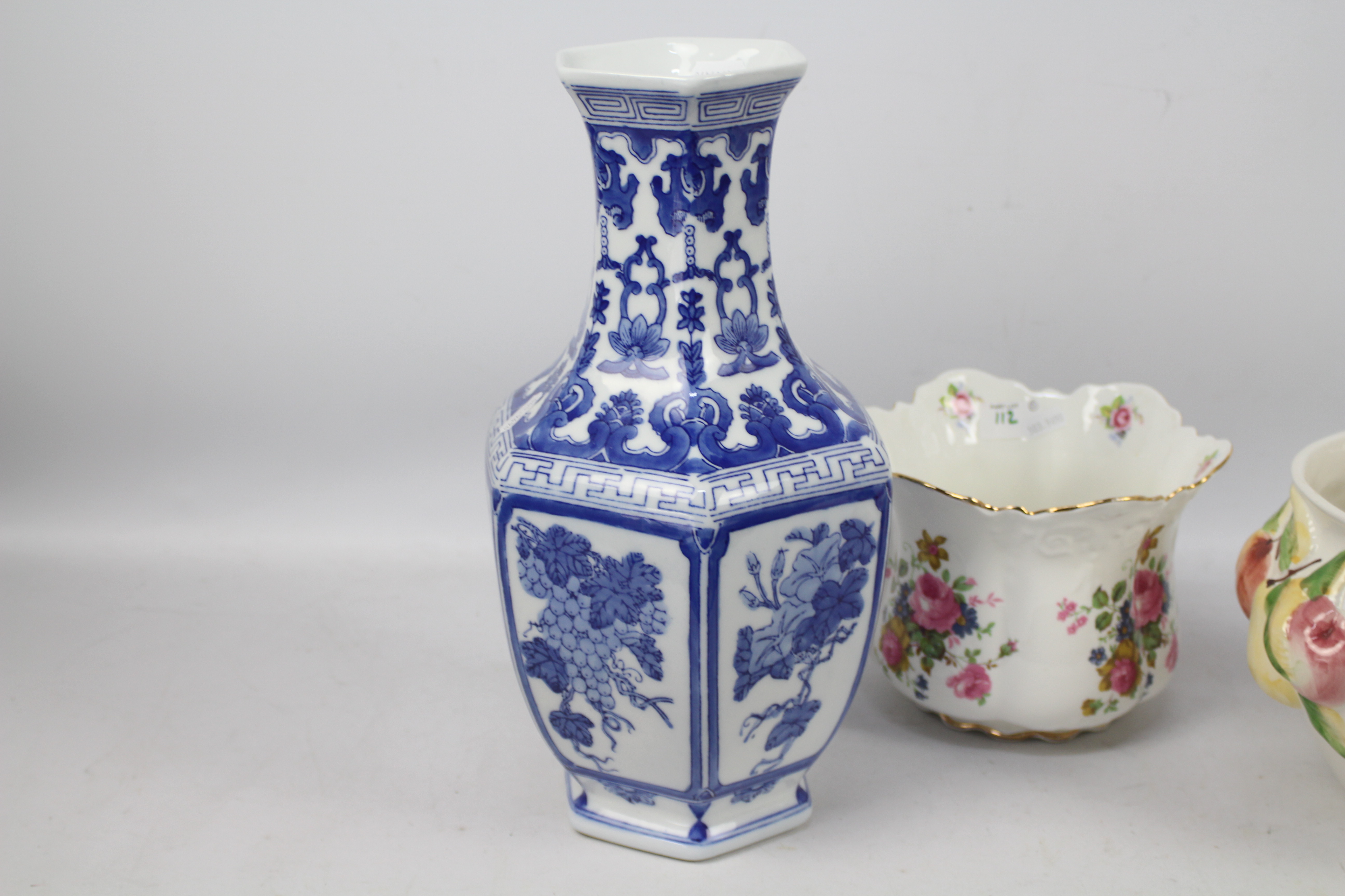 A blue and white, hexagonal section vase, approximately 35 cm (h) and two jardinieres. - Image 2 of 4