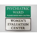 Two cast iron wall signs, Women's Evalua