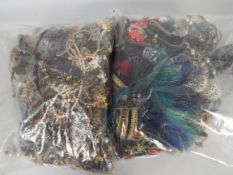 Costume Jewellery - Two clear, sealed bags of unsorted costume jewellery, approximately 10kg.