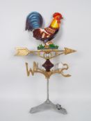 A cast iron weather vane with cockerel s