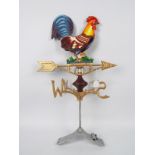 A cast iron weather vane with cockerel s