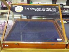 A table top jewellery display with hinged lid,
