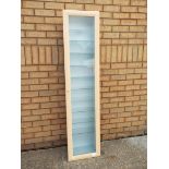 A single door display cabinet, approxima