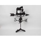 A cast iron weather vane with horse and blacksmith decoration. XWVHR.