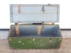 A wooden ammunition crate, approximately