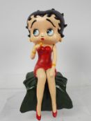 A cast iron, shelf sitting figure depicting Betty Boop singing, 28 cm (h).