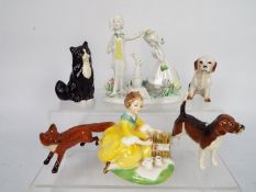 A mixed lot of figures to include Beswick fox and hound,