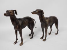 A pair of bronzed, cast iron, figures of greyhounds, approximately 29 cm (h).