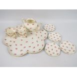 A quantity of Wileman & Co tea wares, pattern 7447, comprising lobed tray, teapot (lacking cover),