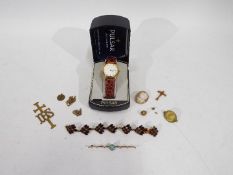A small quantity of costume jewellery and a boxed Pulsar wrist watch
