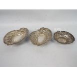 A pair of Victorian silver, pierced dishes, Birmingham assay 1896 and one further,