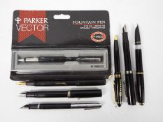 A collection of pens to include Parker,